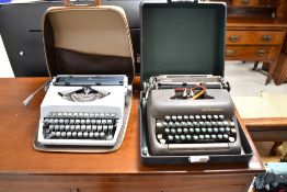 A vintage Imperial typewriter, in grey finish, with zipped case and a Smith Corona typewriter in