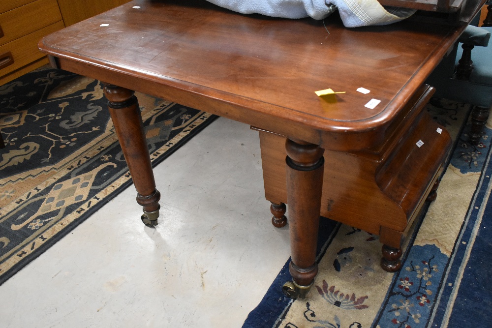 A Victorian mahogany extending dining table , approx W103, length 111 plus three additional leaves