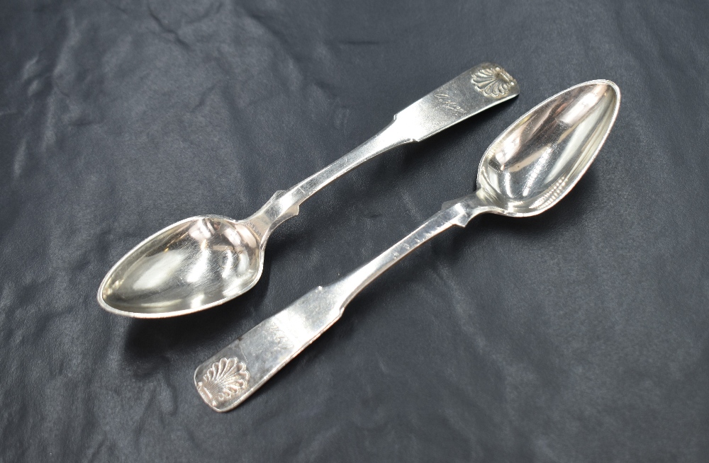 A pair of Finnish silver fiddle pattern dessert spoons, having shell decoration and 'OJH' monogram