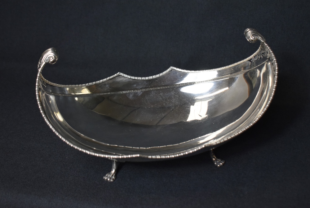 An impressive George V silver bowl, of long boat form having an egg and dart rim with scroll - Image 2 of 5