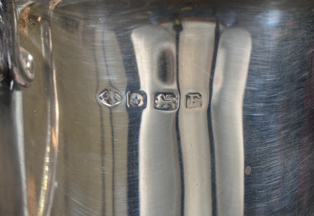 A George V silver tankard, of traditional form having a flared rim, decorative s-scroll handle and - Image 4 of 4