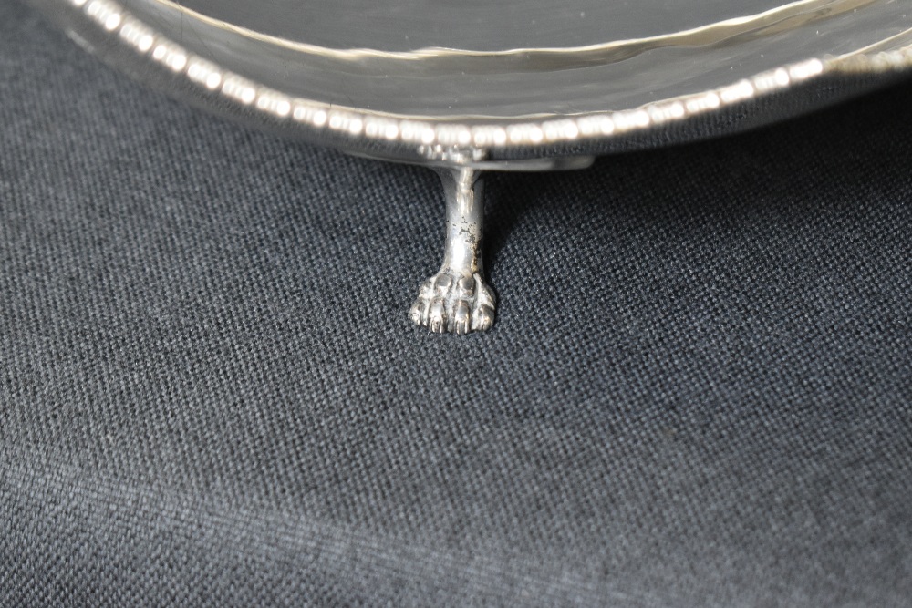 An impressive George V silver bowl, of long boat form having an egg and dart rim with scroll - Image 4 of 5