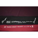 Three fishing rods A DAM 3pc Carbo Mesh Match 3.9m, a Shakespeare Europa 3pc 3.3m and a John