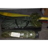 Two small bank side fishing tents a landing net and windbreak