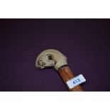 A walking stick with a cast resin head of a horse 144cm long