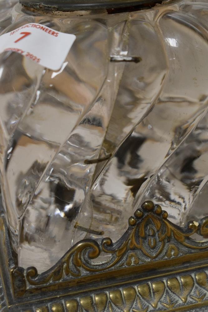 A Victorian cast brass and glass ink well, mounted on an exuberant base having paw feet and stylised - Image 2 of 2