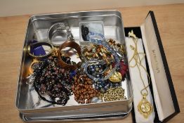 An interesting assortment of ladies costume jewellery, to include a Swiss movement Corocraft