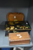 A late 19th century jewellery box decorated with pixies and Hoya Coronaria blume on a black