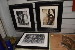 Three framed black and white nude prints, glazed, largest 44cm x 57cm, sold together with another
