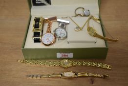 A Cote d'Azur wristwatch, having a rectangular black dial with four baton numerals on a faux leather