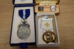 A lot comprising of a British WW2 fraternal Masonic medal, a Royal Masonic institutions medal for