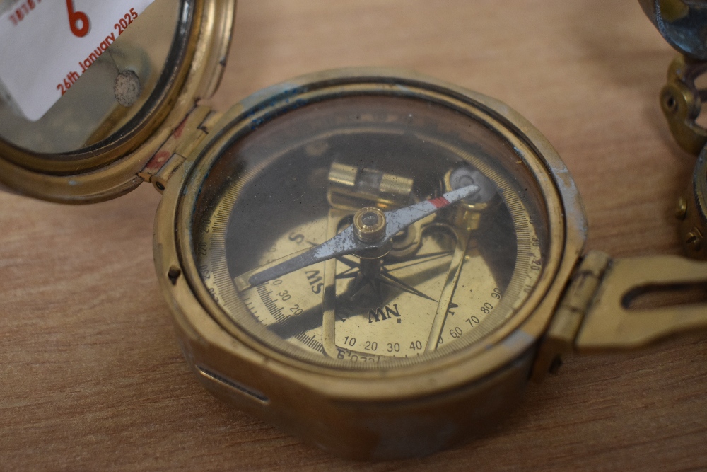 An early 20th century brass military type compass, marked to top 'Stanley London', w7cm, sold - Image 2 of 3