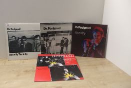 A Dr . Feelgood four album lot in VG+/VG+