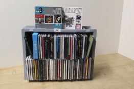 A lot of cd's with folk , classic rock . Americana , and much more on offer here - some great and