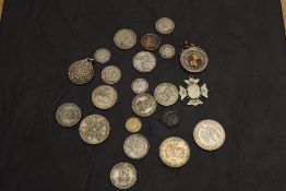A collection of GB & World Silver Coins and Medallions including GB 1921 Florin, 1920, 1921, 1930,