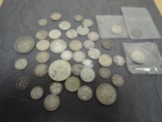 A collection of World Silver Coins including George V 1926 Straight Settlements Ten Cents, 1928