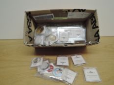 A collection of Windsor Mint Medallions, mixed sizes including Golden Notes x2, Silver Note x2, 1933