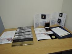 A collection of London Mint Gold Layered Coins, 2010 Sir Douglas Bader 70th Anniversary, 1967