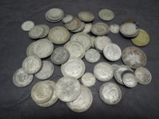 A collection of GB Silver Coins, 1920-1946 Florin x 9, Shilling x 22, Sixpence x 2, Threepence x