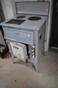 A vintage enamelled electric cooker, Revo R34-A , sold as decorative and untested collectable item