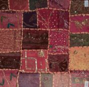 An attractive late 19th century patchwork coverlet fragment, constructed with blocks of material