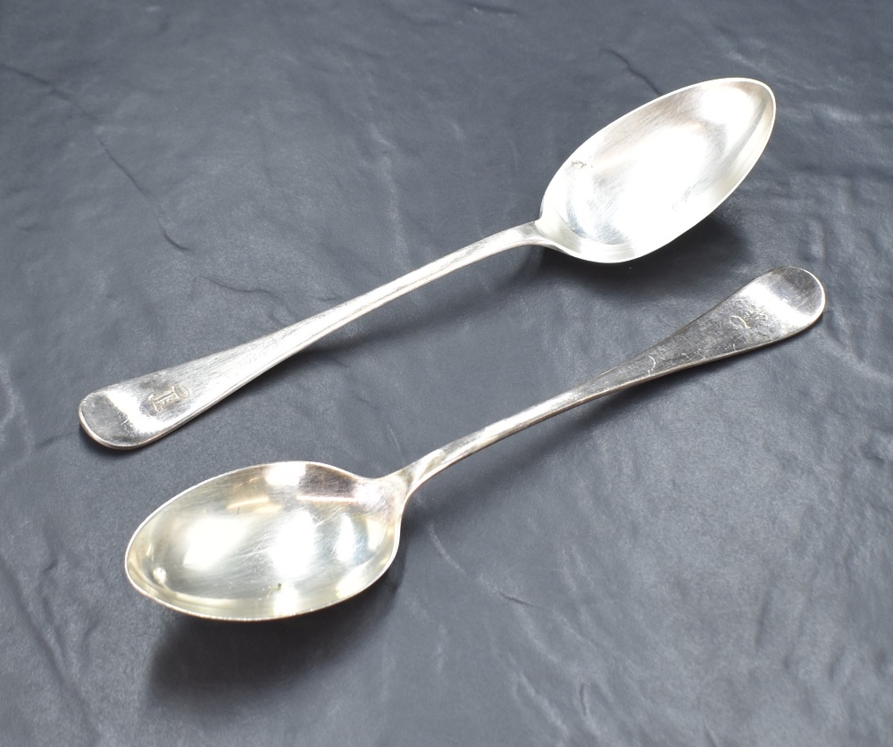 A pair of Victorian silver Hanoverian pattern serving spoons, having an initial engraved to the