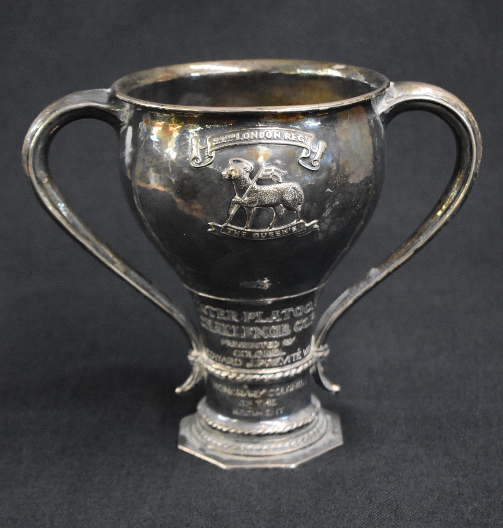 A George V silver Arts & Crafts style trophy, of traditional form having a slightly flared rim,