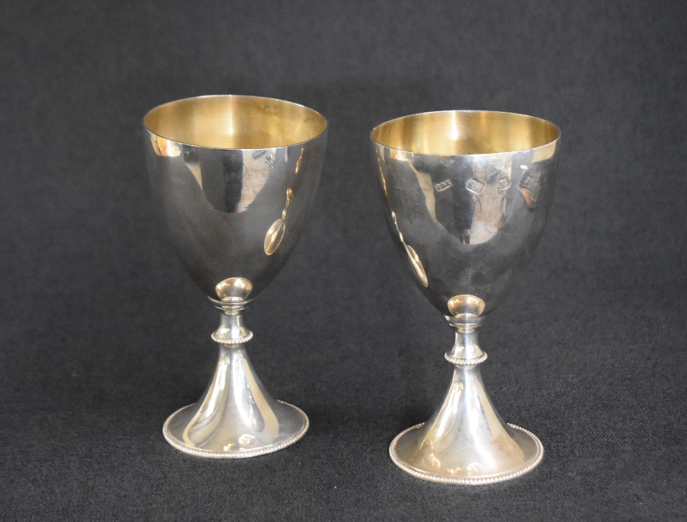 A pair of Elizabeth II silver goblets, of traditional form with gilt interior raised on a knopped - Image 2 of 5