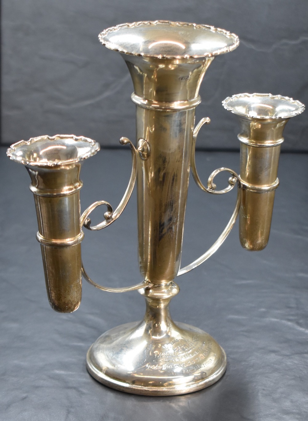 An early 20th century silver epergne vase, the central fluted vase having Chippendale style rim with