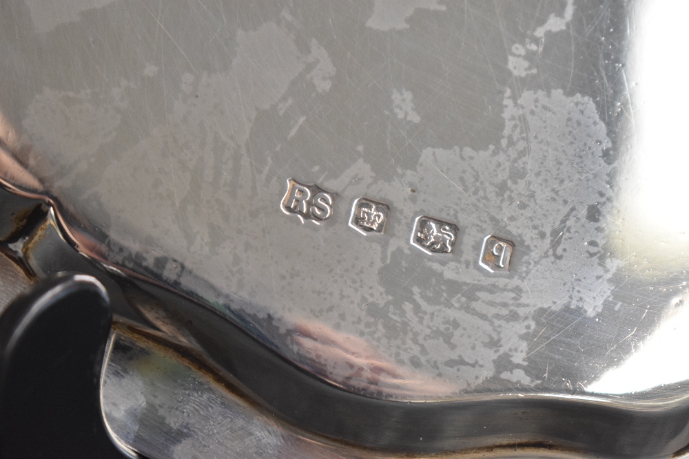 A George V silver salver, of circular form having a Chippendale style rim raised on three scroll - Image 3 of 3