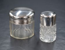 Two silver capped and mounted vanity pots, comprising a powder pot and scent bottle, marks for