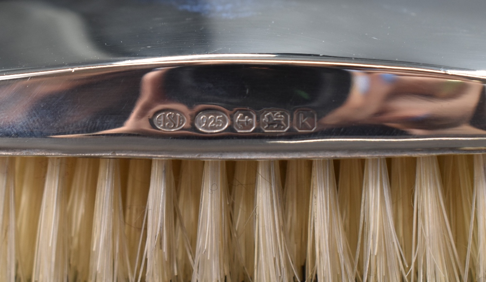 An Elizabeth II silver mounted gentleman's hair brush, of plain rectangular form, along with a - Image 3 of 4