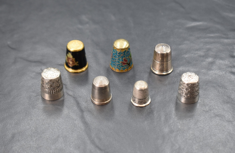 An assortment of seven silver thimbles of various size and design including two Charles Horner '