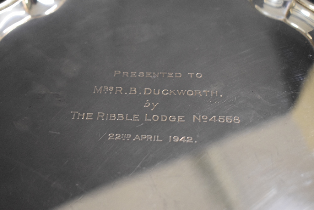 A George VI silver salver, of circular form having a Chippendale style rim, with a central - Image 4 of 4