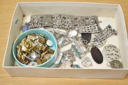 A collection of costume jewellery, including silver earrings, cufflinks and statement bracelets,