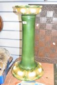 An early 20th century green porcelain Jardeniere stand, missing Jardeniere, h57cm.