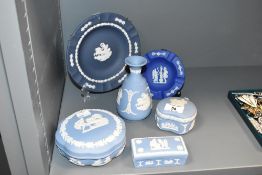 A group of blue and white Wedgwood pottery, impressed marks to base, to include vase, trinket