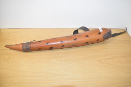 An African water groud having leather strap with muli-coloured bead decoration, L68cm