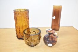 A Ravenhead burnt orange bark vase, h20cm, sold together with a Pukeberg glass candleholder, a Mdina