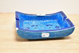 An Aldo Londi for Bitossi ceramic ashtray decorated with geometrical floral patterns on a blue