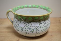 A Royal Doulton Art Nouveau design chamber pot, L25cm