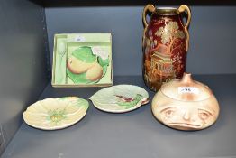 A vintage Carlton ware ovoid vase, decorated in Chinoiserie with gild handles, to include a hand-