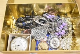 An embroidered motif decorated tin box, containing a small collection of costume jewellery including