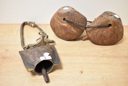 An African leather and iron masai cowbell, L33cm, sold together with a wooden masai cowbell, ( 2 ).