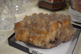 A large citrine cluster variety quartz .