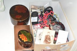 A large assortment of costume jewellery, including beaded jewellery, wristwatches, filigree