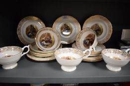 An English fine bone China tea service, decorated with London street scene with gold embellishment