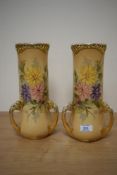 A stylish pair of early 20th century Austrian Turn-Teplitz-Bohemia porcelain three gilt handle vases