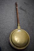 A 19th century copper and brass bed warmer, L114cm