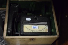 A vintage paper testing instrument in original case, plaque inside reading; instrument serial No S.